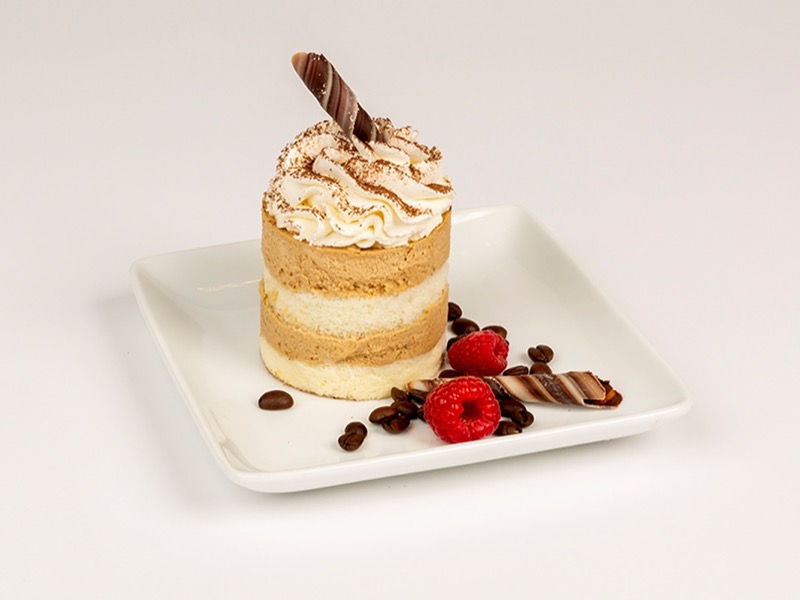 Individual layered tiramisu with a chocolate stick